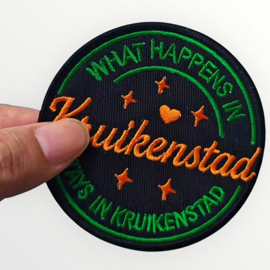 Carnaval embleem What Happens In…